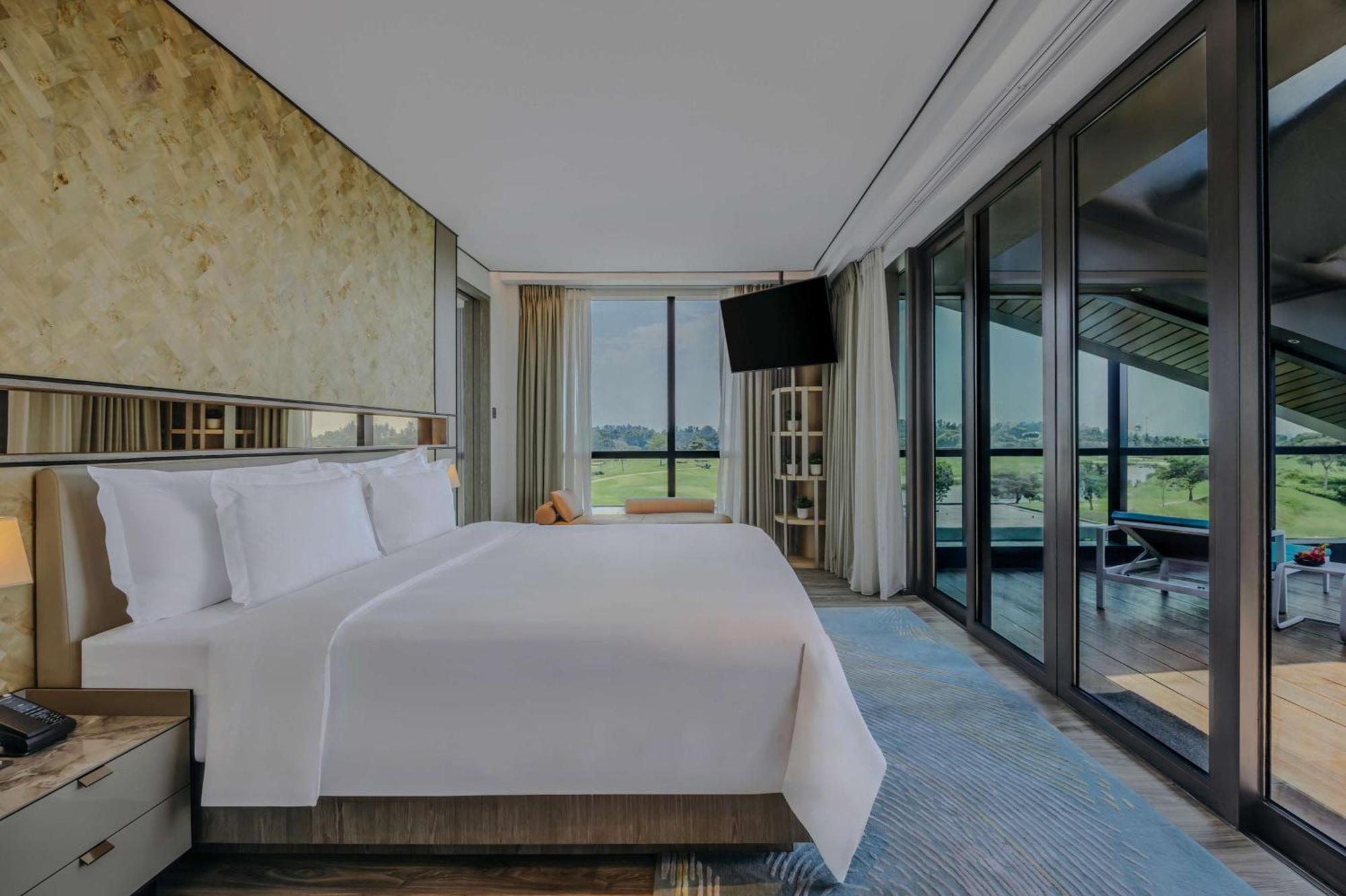 Dusit Thani Laguna Singapore Bagian luar foto A bedroom at the hotel